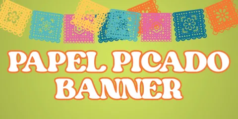 colorful papel picado banner on a lime green background