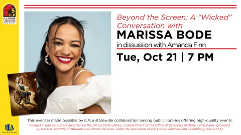 Marissa Bode smiles at the camera. She's wearing silver earrings, red lipstick, and a white dress. 