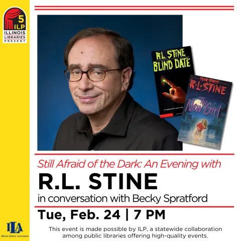 A photograph of R. L. Stine beside several of his books. 