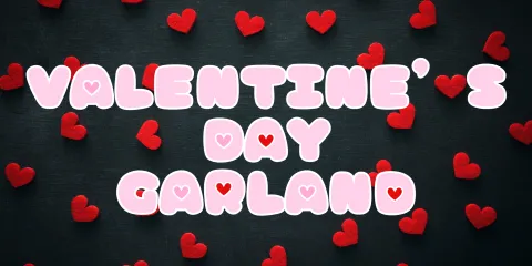 red hearts scattered around a black background