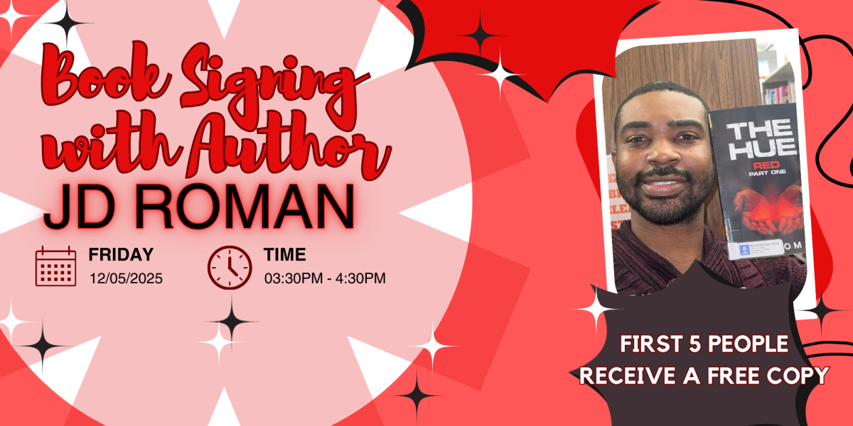 PHOTO OF J D ROMAN HOLDING A COPY OF HIS BOOK THE HUE: RED PART ONE